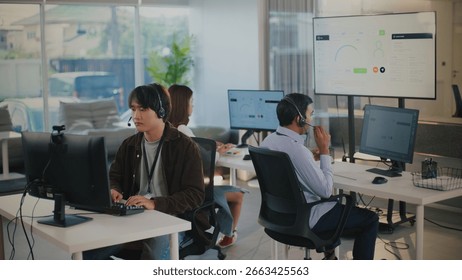 Focused tech support agent provides excellent customer service from busy call center office. helpful operator offers solutions and assistance to clients - Powered by Shutterstock - Get 15% off with code: PIKWIZARD15