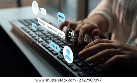 A focused view of hands typing on a keyboard, surrounded by floating chat bubbles symbolizing digital communication in a vibrant office setting. Gantry
