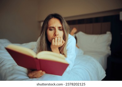 
Focused Woman Reading a Captivating Book in Bed
Millennial girl enjoying an interesting thriller novel with plot twists 
