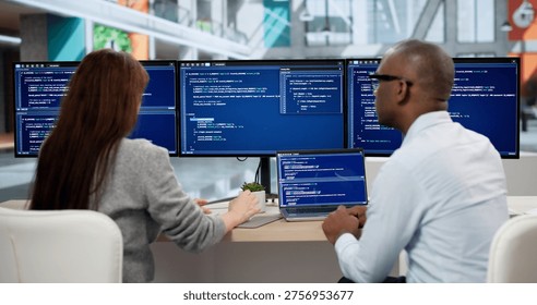 Focused Young Programmers Coding On Computers, Collaborating In Office Meeting. Agile Software Developers Analyze Data - Powered by Shutterstock - Get 15% off with code: PIKWIZARD15