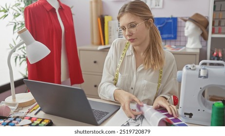 A focused young woman examines fabric swatches in a well-equipped tailor shop, highlighting creativity in fashion design. - Powered by Shutterstock