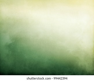 Fog And Clouds On A Green To Yellow Textured Gradient Background.  Image Displays A Pleasing Paper Grain And Texture At 100%.