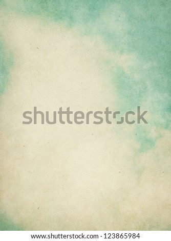 Fog and clouds on a textured vintage background with grunge stains.  Image has a pleasing paper grain visible at 100%.