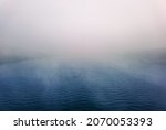 Fog descend on the calm waters of the Volga river in the Russian city of Tver creating a moody atmosphere