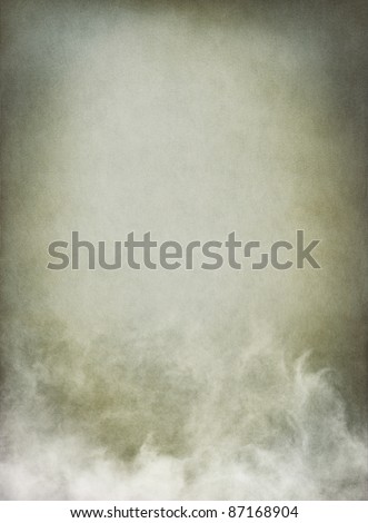 Fog, mist, and clouds with subtle gray tones.  Image has a pleasing paper texture and grain pattern visible at 100%.