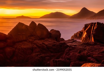 Fog in the mountains at dawn. Beautiful sunrise over mountains in early morning fog. Mountain fog at dawn. Sunrise mountain fog landscape - Shutterstock ID 2199052031
