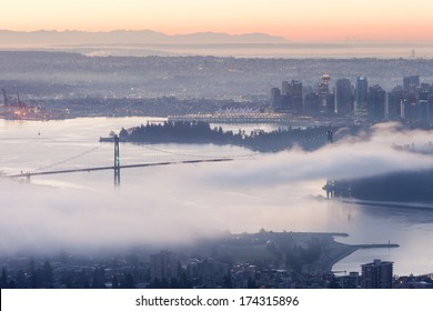 Fog Over Lions Gate Bridge In A Vancouver Winter Morning