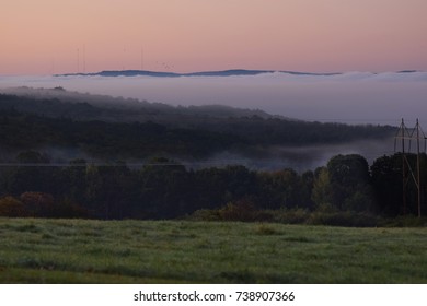 Fog Over the Valley - Shutterstock ID 738907366