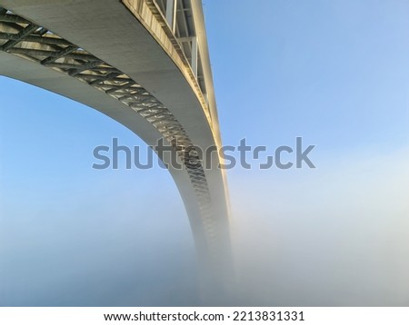 Fog in Porto Portugal on the Douro River looking at the Ponte da Arrabida bridge