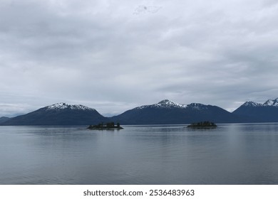 Foggy Alaskan Mountain Range Coastline - Powered by Shutterstock