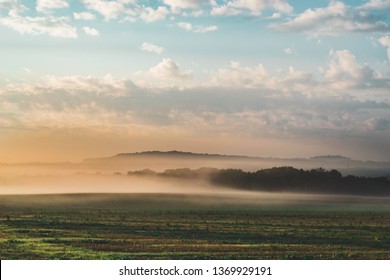 Foggy Early Morning Field landscape in the Countryside of France, Benney (Meurthe-et-Moselle) Beautiful Colored Sunset with Fog and Sea of Clouds Covering the Forest in Moody Atmosphere
