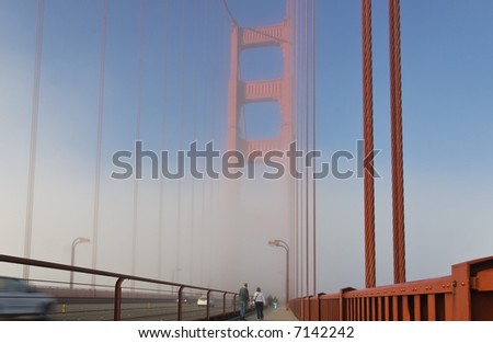 Foggy Goldengate Bridge with walkers