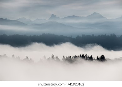 Foggy layered mountain landscape in Fort Langley, British Columbia, Canada