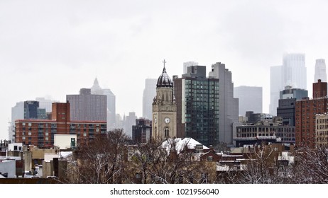 A foggy Manhattan on a snowy day in New York. Taken from the East Village. USA