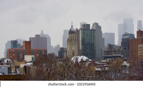 A foggy Manhattan on a snowy day in New York. Taken from the East Village. USA