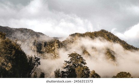 Foggy Mist Enshrouded The Mountains In The Morning In New Zealand - Powered by Shutterstock