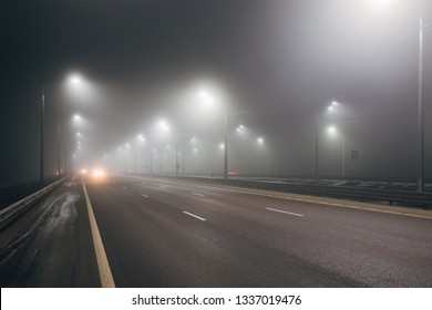 Foggy Misty Night Road Illuminated By Stock Photo 1337019476 | Shutterstock