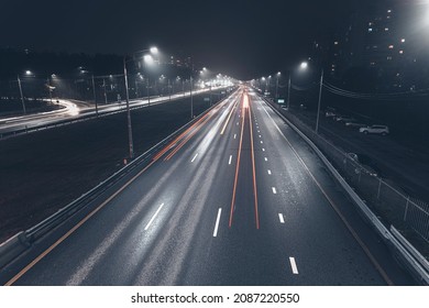 Foggy Misty Night. Road Illuminated By Street Lights, Aerial View.