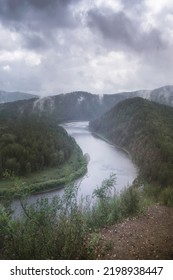 Foggy Morning In A Hilly Valley Landscape River, Atmospheric Mood, Vertical Photo