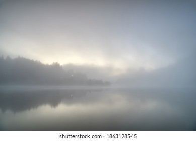 Foggy morning at a lake