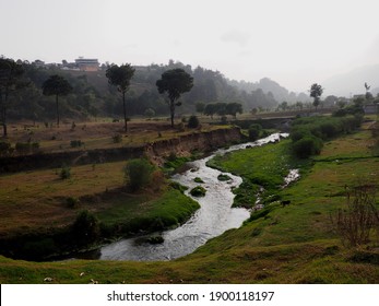 Foggy Morning Landscape With A River In Guatemalan Highlands