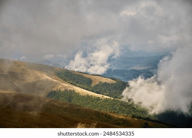 Foggy Mountain Landscape With Rolling Clouds Over Lush Greenery. Borzhava range during summer. Carpathian mountains, Ukraine - Powered by Shutterstock