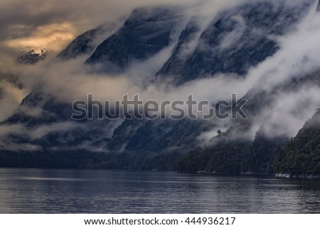 foggy mountain scene in milfordsound fiordland national park soutn island new zealand important traveling desination