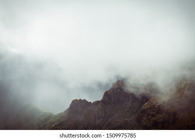 Foggy mountain that can represent danger.