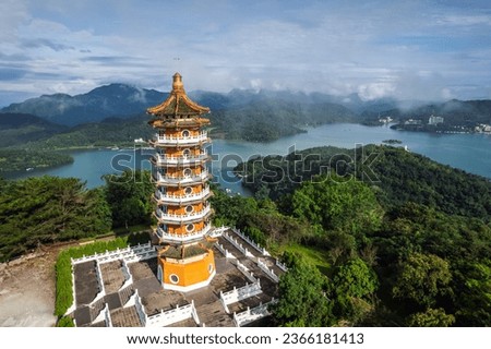 Foggy mourning at the Ci En Pagoda at Sun Moon Lake was built by Chiang Kai-shek in memory of his mother, Nantou County, Taiwan. Stock fotó © 