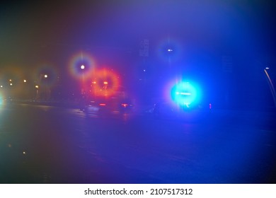 Foggy Police Lights In Downtown Calgary