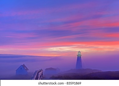 Foggy sunrise at Cape Spear.