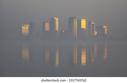 Foggy Tampa Morning With Architecture And Sunrise