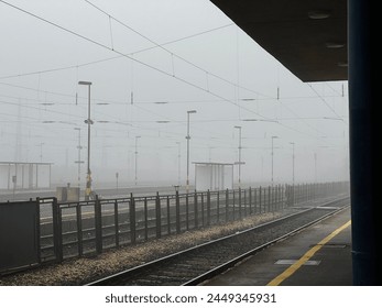 Foggy train station in Hungary - Powered by Shutterstock