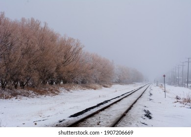 Foggy view down some train tracks