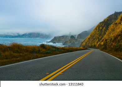 Foggy Winding Road Along California Coast