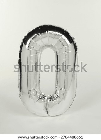 Foil balloon in the shape of the number zero
