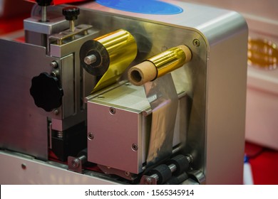 Foil stamping machine. - Shutterstock ID 1565345914