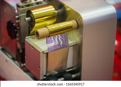 Foil stamping machine. - Shutterstock ID 1565345917