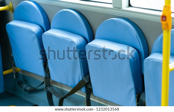 foldable passenger seat in modern bus , interior public transportation