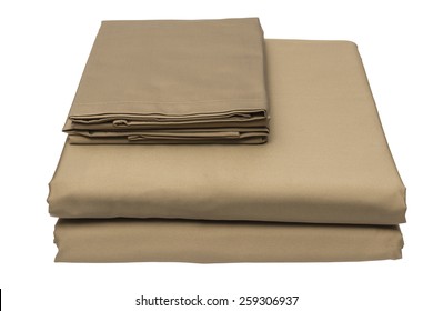 Folded Bed Linen Or Duvet Cover On White Isolated Background