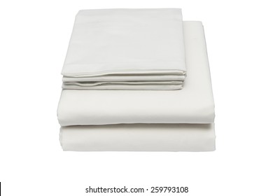 Folded Bed Linen Or Duvet Cover On White Isolated Background