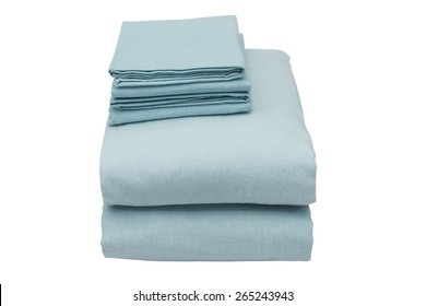 Folded Bed Linen Or Duvet Cover On White Isolated Background