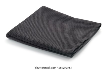 Folded Black Cotton Napkin Isolated On White Background