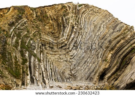 Folded, clastic strata on the Jurassic Coastline, Lulworth cove, Dorset, UK 