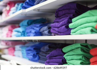 Folded Colored Tshirts In A Shop