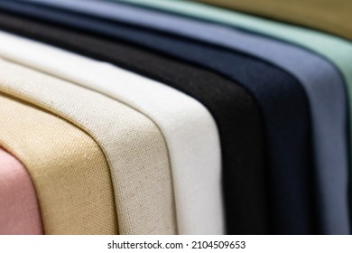 Folded colorful linen mixed fabric texture background. This is made of linen and polyester.