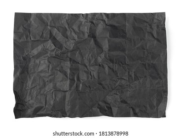 Folded Crumpled Black Paper Texture Background. Dark Wrinkled Rolling Paper Sheet Pattern with Copy Space. Creased Page Wallpaper
