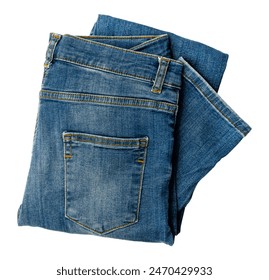 Folded dark blue jeans on a white background. Cloth. Jeans isolate