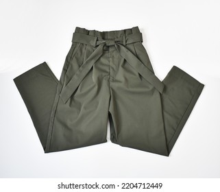 Folded Khaki Green Pants With Belt Front View On White Background