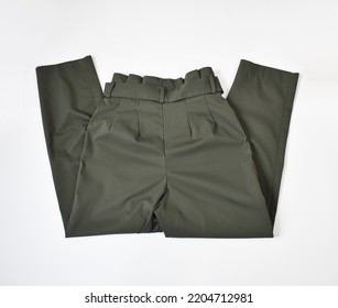 Folded Khaki Green Pants With Belt Back View On White Background